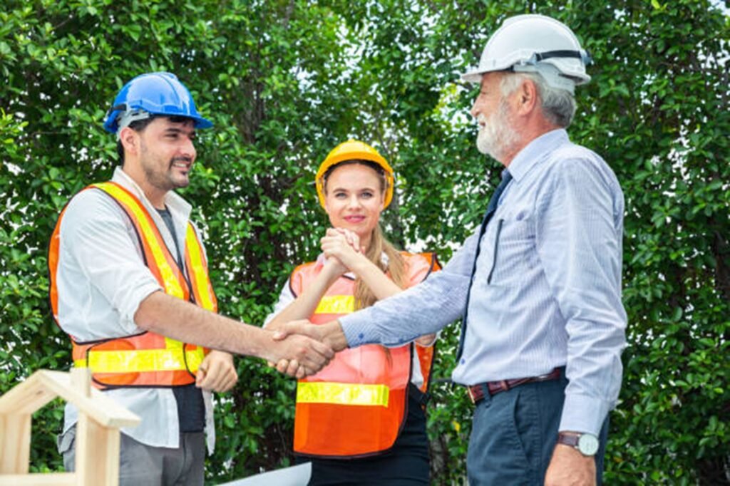 Tree trimming and pruning service in Willowick with a professional crew carefully cutting tree branches near a residential property.